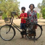 Ratha with his bike donated by Kim Wilder