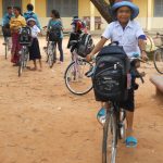 Happy student with new bicycle